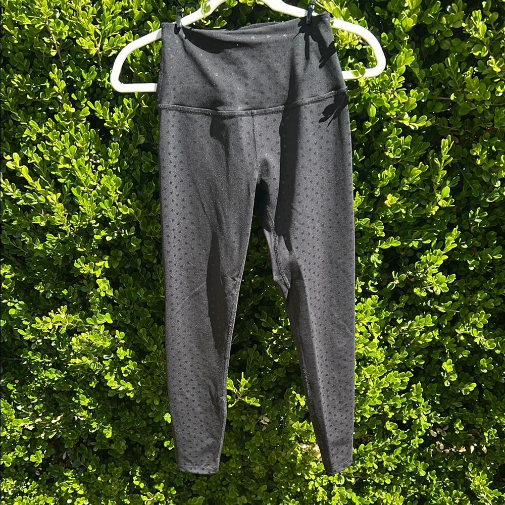 Black Leggings with heart print.